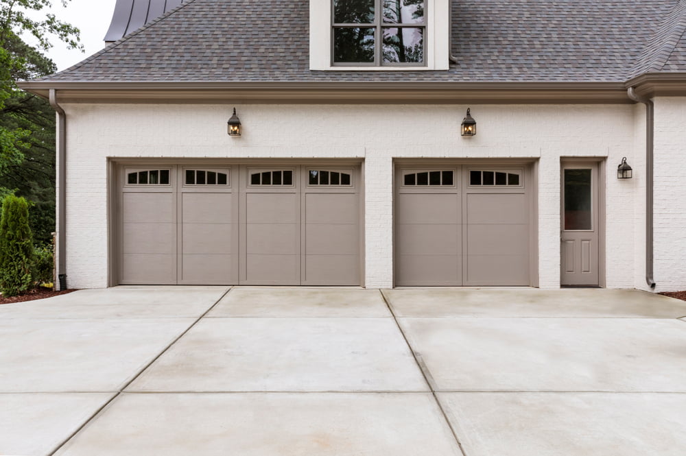 Garage door with recessed panels