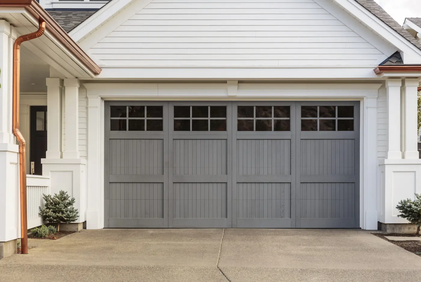 Gray garage door with window inserts 2